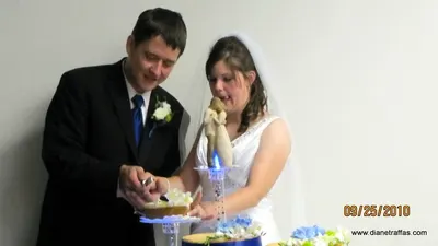 Mr and Mrs Traffas cut the cake