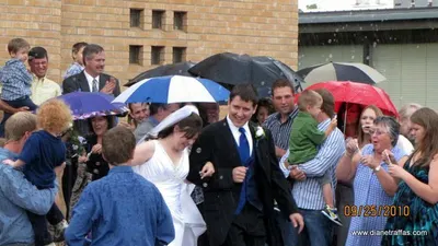 Mr and Mrs Traffas heading for the limousine