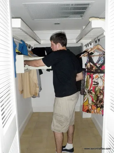 Reaching into the safe in the closet
