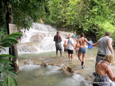 The bottom of the falls by the beach
