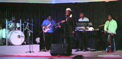 The house band with a different singer on the main stage.